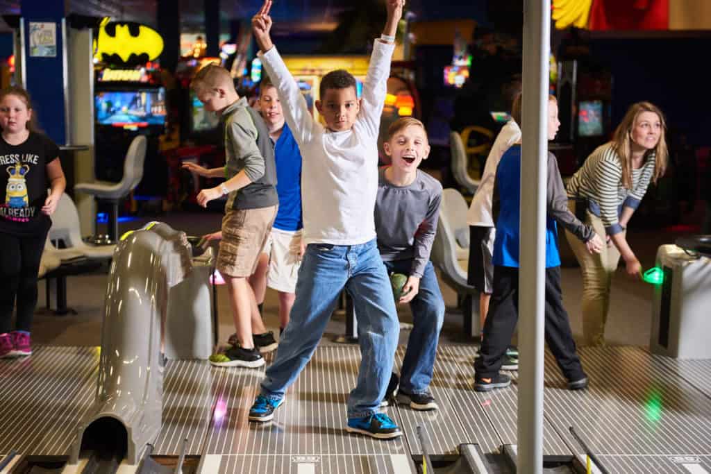 Image of children playing mini bowling at Kokomo Joe's Winter Break